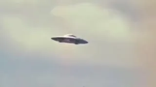 The Clearest And Detailed Silver Metallic Flying Saucer Filmed Flying Over People's Home's