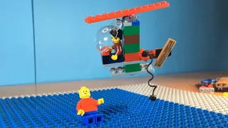 A Man has fallen into the river in Lego City