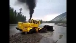 russian kirovets K 701 tractor stuck in river