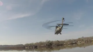 At the water's edge with the UH-60 Blackhawk.