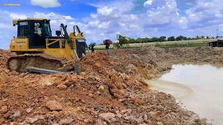 THE project showing Land Filling Up Dozer SHANTUI DX 17 XL WITH dump truck 25.5 ton