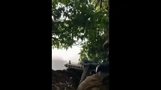 Gunner POV: A Ukraine Azov fighter fires on Russian troops using a German MG3 machine gun