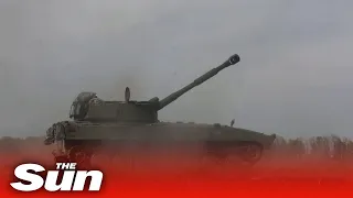 Ukrainian forces fire self propelled howitzers in Kharkiv region