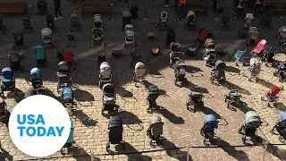 Empty strollers honor 109 killed children in Ukraine | USA TODAY