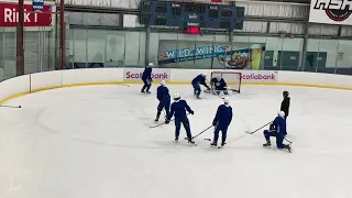 (close-up) Canucks Podkolzin tries "Header" to score.