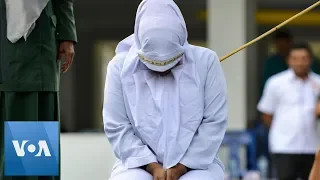 Indonesian From Islamic Advisory Body Caned for Adultery