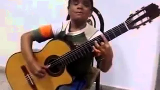 Titanic theme song on guitar by a 6 years old kid