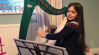 6 year old child harpist Effie playing The First Nowell (from Sylvia Woods) on Salvi Mia lever harp