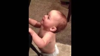 Laughing baby blows up diaper