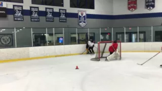 1 on 2 Pin Drill: O starts with puck on boards