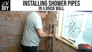 How to Install Shower Pipes in a Brick Wall - Bathroom Renovation 04 - DIY Vlog #19