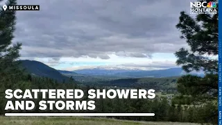 SHOWERS AND STORMS: Scattered showers and storms, breezy afternoon winds