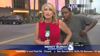 Thug Abuses News Reporter on Live TV (Funny Videobomb Scares News Reporter)