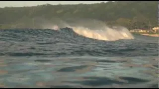 German super kid surfing big waves and scuba diving in Hawaii