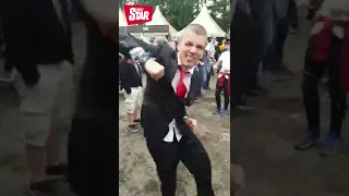 Guy looks out of place wearing a suit to a festival, until the beat drops #shorts