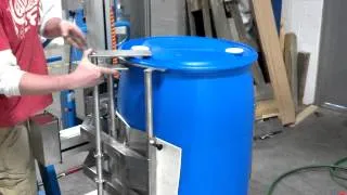 55 Gallon Plastic Drum Lift and Pour.mp4