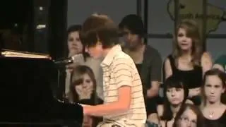 amazing 12 year old boy Greyson Chance plays Lady Gaga paparazzi on the piano live!