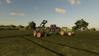 stacking silage bales with the Fiat 88 94 and hauling in the jd 7810 ~Aghlee farm Fs19 timelapse