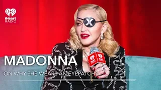 Why Is Madonna Wearing An Eyepatch? | iHeartRadio ICONS