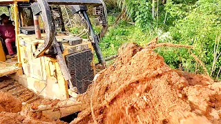 Bulldozers D6R XL Form Roads in Oil Palm Plantations
