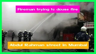 MUMBAI TIMES: Fireman trying to douse fire at Abdul Rahman street in Mumbai