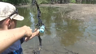 Nine Year Old Boy Bow Fishing River Monsters!