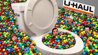 WORLDS LARGEST TOILET IN MOVING TRUCK FULL OF BALL PIT BALLS