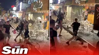 Mob of 20 Brits hurl tables and chairs in mass brawl at Portuguese bar