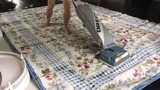 Trying to Vacuum Wrinkles out of New Rug that has been Rolled up for 15 Years