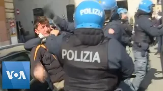 Protesters Fight with Police Outside of Rome Prison