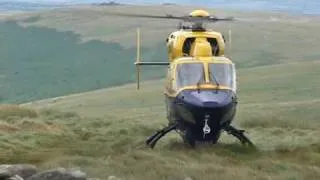 Police helicopter landing Dartmoor