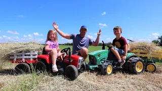 Using real tractors and clues to find our new kids tractor | Tractors for kids