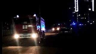 7 old and new Ukrainian fire trucks responding in a row with lights