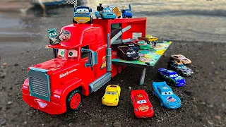 Looking for Disney Pixar Cars On the Rocky Road : Lightning McQueen, Mater, Dinoco McQueen, Mack