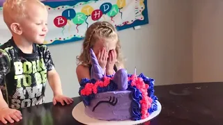Baby crying because of blowing candles fails.