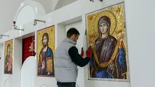 Installation of mosaics on Iconostasis