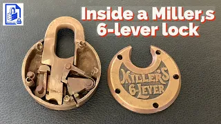 699. A look at how the lock mechanism & levers work inside a vintage Millers 6 lever pancake padlock