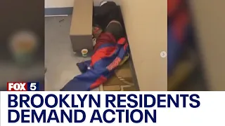 Residents outraged over homeless man sleeping in stairwell in Brooklyn