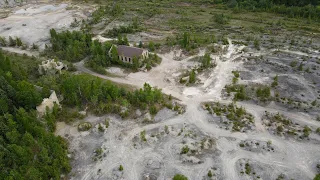 Fly over the ghostly remnants of a limestone quarry in Michigan's Upper Peninsula