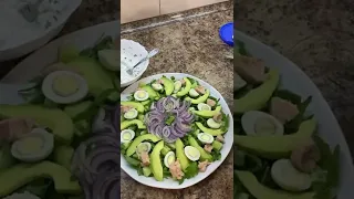 Salad with arugula and cod liver