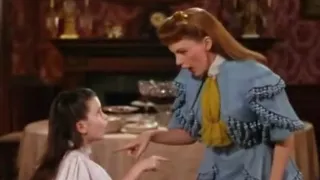 JUDY GARLAND: 'THE CAKE WALK' WITH TOOTIE, SINGING 'UNDER THE BAMBOO TREE'. A CLOSEUP.