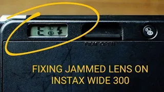 Fixing jammed lens on FujiFilm Instax Wide 300