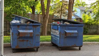 Recycling Truck Empties Overflowing Recycling Bins