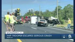 Box truck smashes into FHP trooper's vehicle on Florida's Turnpike