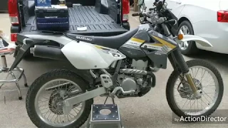 First oil change on Suzuki DRZ 400s with Rotella T6 and my Marty McFly truck.