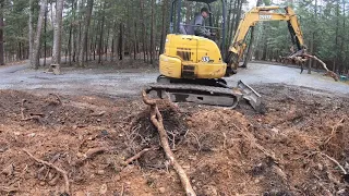 Using the stump ripper on a job and clearing/hauling debris away