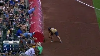 SD@MIL: Fan takes a tumble onto the playing field