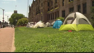 2 city employees assaulted near protests outside St. Louis City Hall