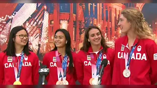 Canadian Olympic swimmers back home