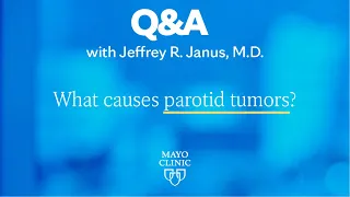 What causes parotid tumors